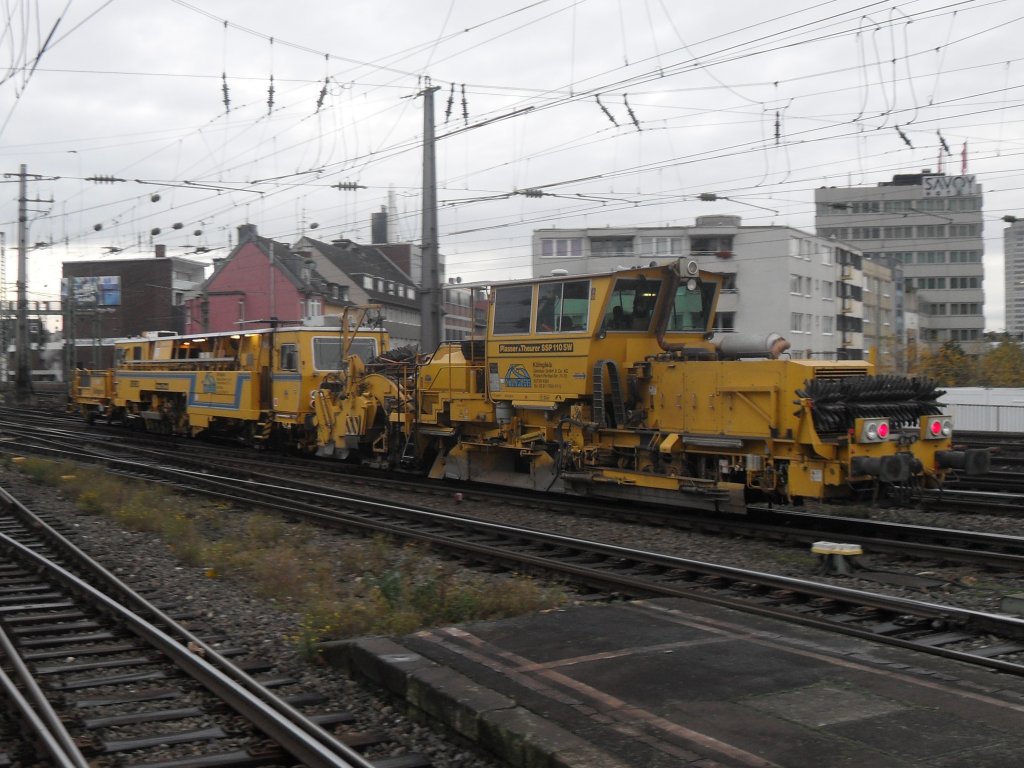 Mitzieher bei einem Bauzug im K�lner Hbf.