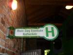 Das Schild einer Bushaltestelle im Lokschuppen in Asbach.Da nach der Stilllegung der Rhein-Sieg-Eisenbahn der ehemalige Lokschuppen als Busdepot benutzt wurde und er jetzt als Museum dient h�ngt es